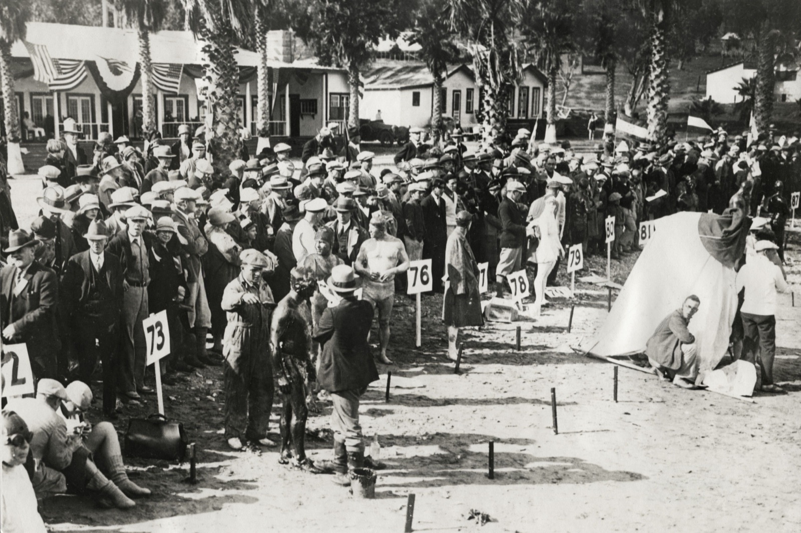 Competitors in the 15 January 1927 race, numbered and covered in grease, before the start.
