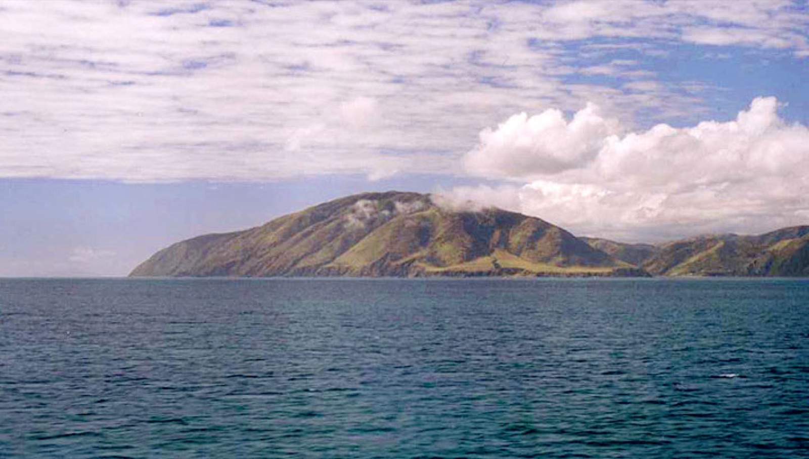 Cape Terawhiti seen from the strait: Barrie Devenport set off from here in 1962.